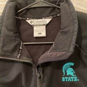 Columbia Black full zipper black with teal Michigan state logos. Men’s XLG